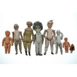 Eight various 19th century and later dolls' dolls, in bisque, composition and acetate,