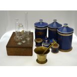 Three large 19th century pottery apothecary jars and covers with blue glaze, 27 cm,
