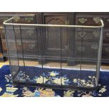 A Victorian brass rail and steel wired nursery fire guard,