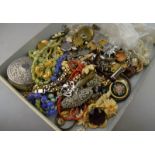 A large quantity of vintage jewellery including three paste-set double clip brooches,