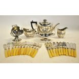 An oval three-piece half-reeded electroplated tea service, to/w a sugar scuttle,