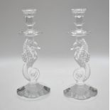 A pair of heavy Waterford crystal candlesticks, the long columns formed as sea horses, 29 cm high