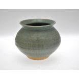 Katharine Pleydell-Bouverie (British 1895-1985) - a stoneware globular pot with vertical fluting,
