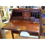 An Edwardian Sheraton Revival red walnut ladies bureau,