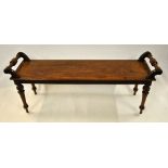A Victorian mahogany window seat with single piece top having turned hand rails,