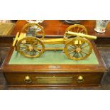 A model 1795 9pdr field-gun, mounted on a cigar humidor with cedar-lined drawer,