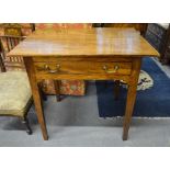An 18th century elm side table, the wide two plank top over a frieze drawer,