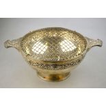 A heavy quality Scottish silver rose-bowl in the form of an oversize quaich with twin handles and