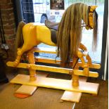 A hand-carved rocking horse, limewood, no.