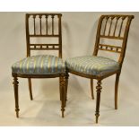 A pair of Victorian giltwood side chairs with overstuffed silk upholstered seats (2)