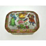 A Chinese Canton famille rose rectangular chamfered soap dish, drainer and cover decorated with