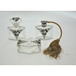 An Art Deco heavy cut glass boudoir set comprising a scent bottle, perfume bottle with atomiser