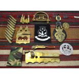 Assorted militaria including; an RN brass bosun's call; RNA Andover alloy crest;