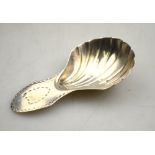 A George III silver caddy spoon with shell bowl and bright-cut handle, George Smith & William Fearn,