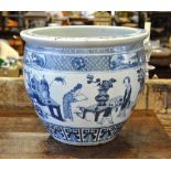 A Chinese blue and white large jardiniere decorated with figures in an interior, late 19th/early