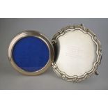 A silver letter salver with pie-crust rim and hoof feet, Mappin & Webb,