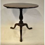 A George II mahogany tilt top tripod table on pad feet Condition Report Dimensions - 73 cm dia x