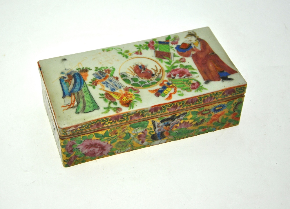 A Chinese 19th century Canton famille rose rectangular two compartment box and cover decorated