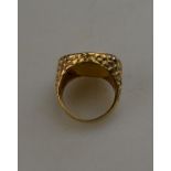 An Edwardian gold half sovereign, 1913, in 9ct repouse decorated ring, approx 13.