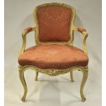 A 19th century French side chair with off-white painted frame and pink satin upholstered back panel