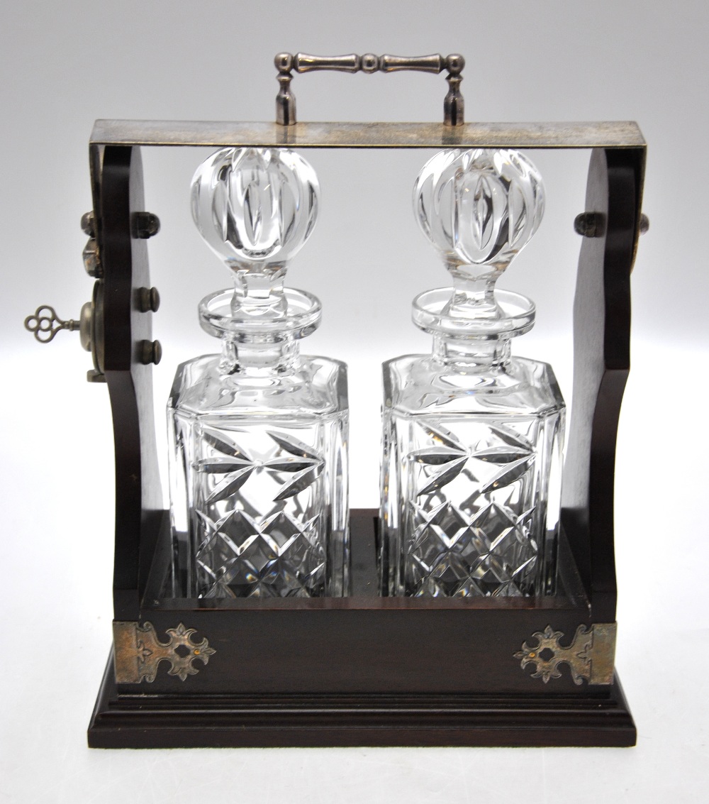 A modern two-bottle tantalus with plated mounts and fitted with square decanters - Image 4 of 4