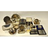 A quantity of plate including fruit bowls, bottle coasters, tea knives with loaded silver handles,