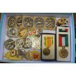Assorted world militiary badges and insignia including Soviet Union, Germany; USA, etc.