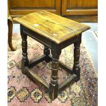 A 17th century style jointed oak stool,