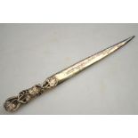 A silver letter knife with chased vine handle, Warwickshire Reproduction Silver, Birmingham 1970, 1.