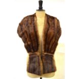 A shadowed mink fur stole retailed by Eric's Furriers, Southampton Condition Report Worn condition