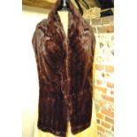 A 'crimson' brown squirrel fur stole retailed by Eric's Furriers, Southampton Condition Report  17