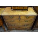 A George III mahogany cross-banded chest of two short over three long graduated drawers