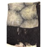 A 1920's Chinese black silk satin shawl with silvered stylized chrysanthemums, 130 x 96 cm plus 48