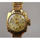 A lady's 9ct gold Avia wristwatch with 17-jewel Incabloc movement, on mesh braclet strap,