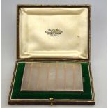 A heavy quality cigarette case with parcel gilt and engine-turned decoration, West & Son,