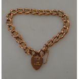 A 9ct rose gold fancy curb bracelet with 9ct padlock attached, Chester 1918, approx 14g,