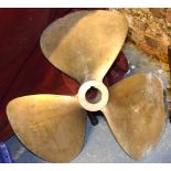 A large bronze ship's propellor with three foils,