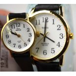 A gent's and a lady's Timex wristwatches to/w ladies gilt metal wristwatch (3)