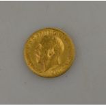 An Edwardian gold sovereign,