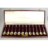 A limited edition cased set of twelve silver gilt replica Tichborne Spoons, with figural finials,