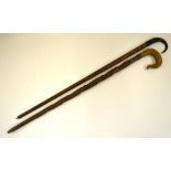 A Swiss walking stick with chamois horn handle,