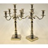 A large pair of electroplated four-branch candelabra,