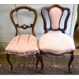 A set of four Victorian walnut salon side chairs with overstuffed seats,