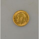 An Edwardian gold half sovereign,