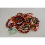 Five rows of various beads including garnet and agate,