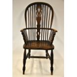 A 19th century elm seat stick back armchair Condition Report Stretchers replaced