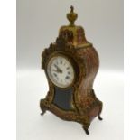 A 19th century brass inlaid boulle mantel clock,