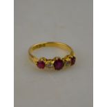 A Victorian ruby and diamond five stone claw set ring, Chester, 1899 Condition Report Rubies