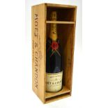 A cased jeroboam of Moet & Chandon Brut Imperial champagne in presentation box