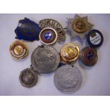 Enamel and silver badges relating to Cheshire